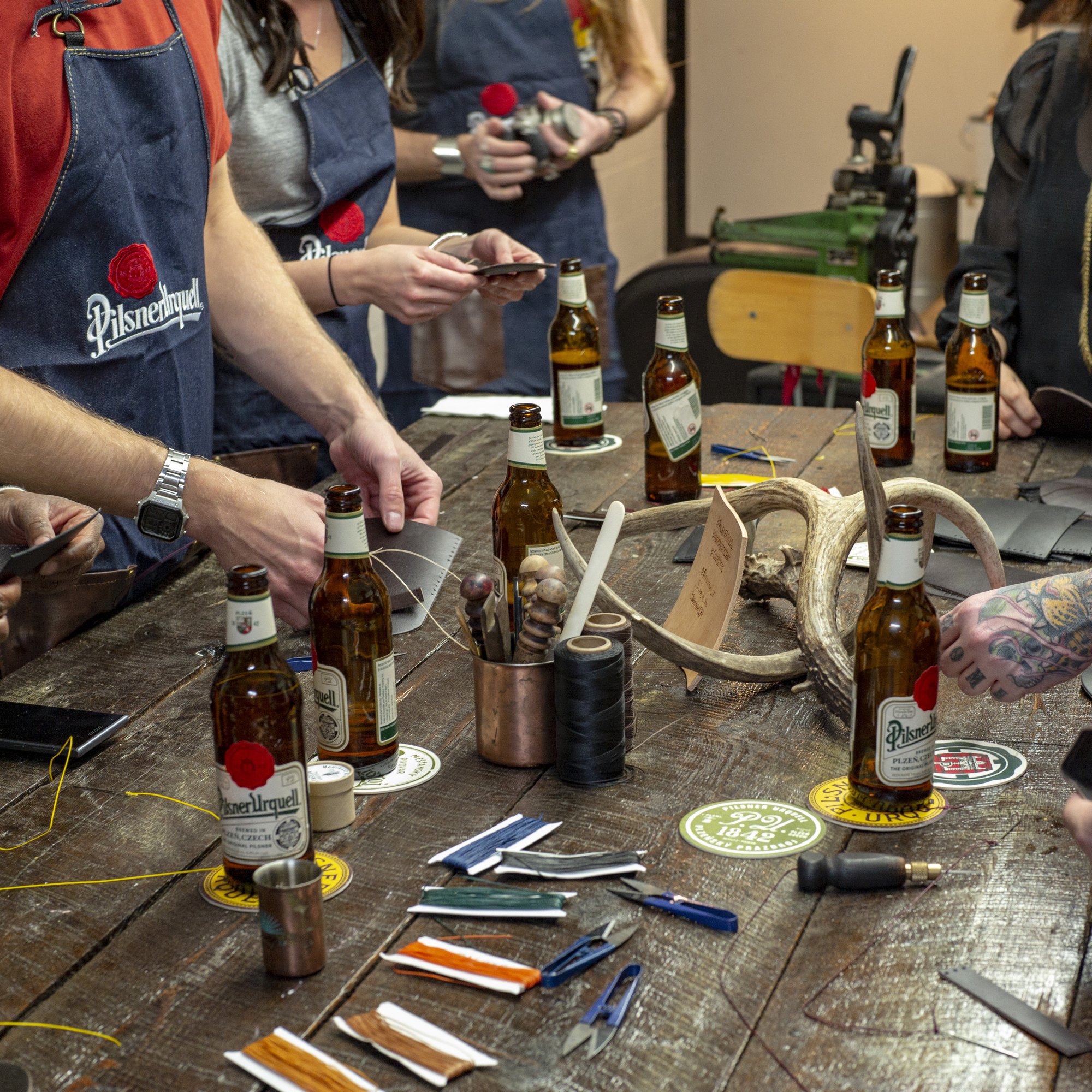 Pilsner Urquell bottles at a live craft activation in Toronto